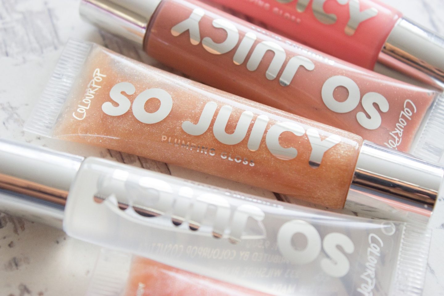 ColourPop So Juicy Plumping Gloss: Lip Gloss dengan Plumping dan Kilau Sempurna